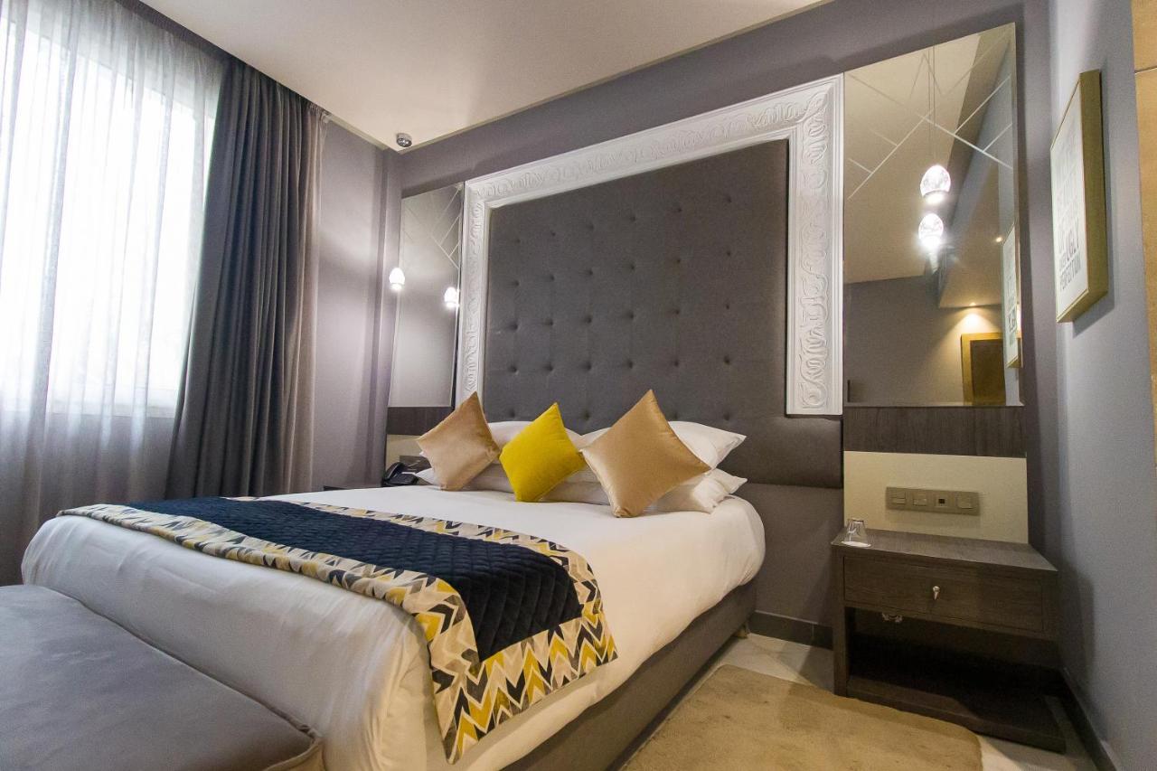 Mandarin Palace Hotel & Spa Tanger Exterior foto A bedroom at the hotel