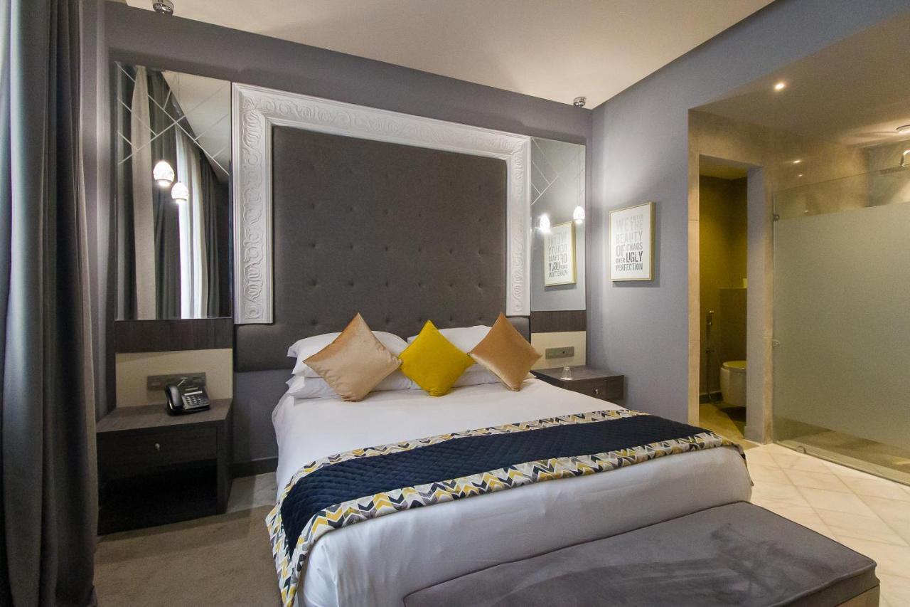 Mandarin Palace Hotel & Spa Tanger Exterior foto A bedroom at the hotel