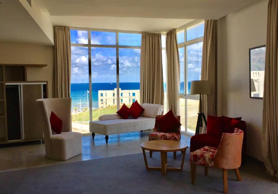 Mandarin Palace Hotel & Spa Tanger Exterior foto A living room at the hotel